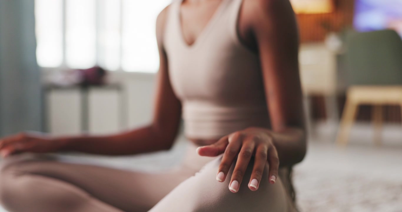 Woman Practicing Yoga and Meditation in Comfortable Home Setting
