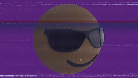 animación del icono emoji de las gafas de sol sobre la pantalla con ruido
