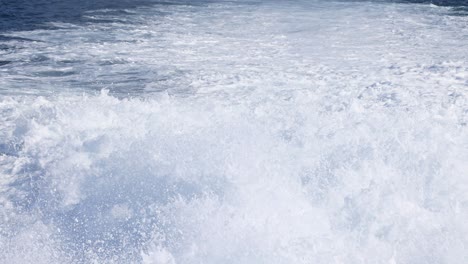 powerful waves splashing against the shore