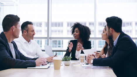 a group of businesspeople having a meeting