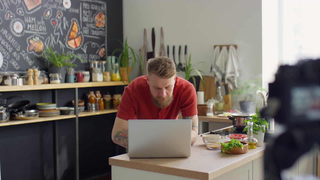 Food Blogger Working on Laptop in Kitchen Studio