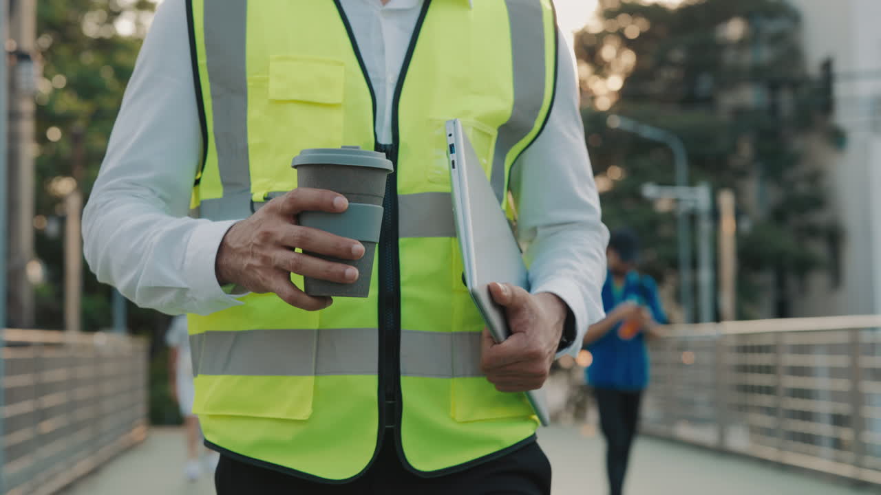 Worker with Laptop and Coffee Cup