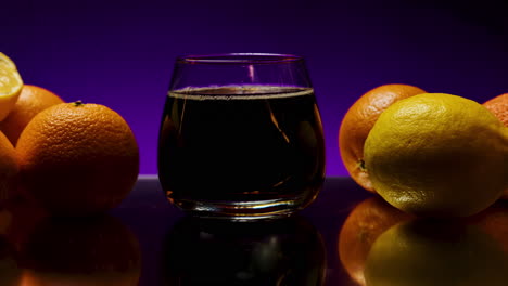 dark soda with oranges and lemons