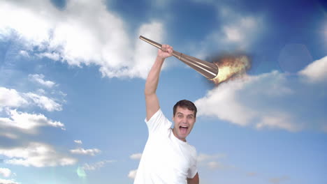 Montage-of-triumphing-athlete-holding-Olympic-torch-over-head