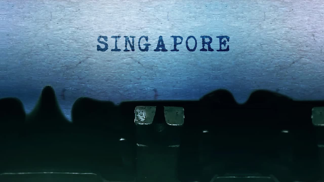 Singapor word closeup being typing and centered on a sheet of paper on old vintage typewriter