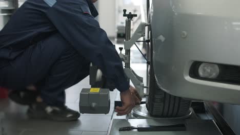 car wheel alignment in a garage