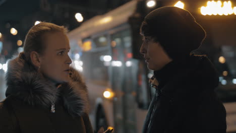 Women-friends-talking-in-the-street