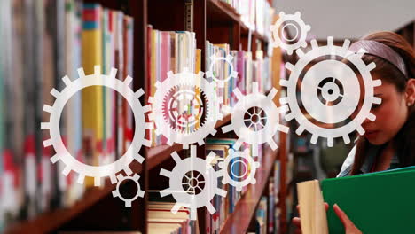 gears and cogs animation over person reading book in library