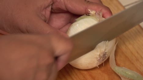 A-yellow-onion-peeled-and-diced-on-a-cutting-board