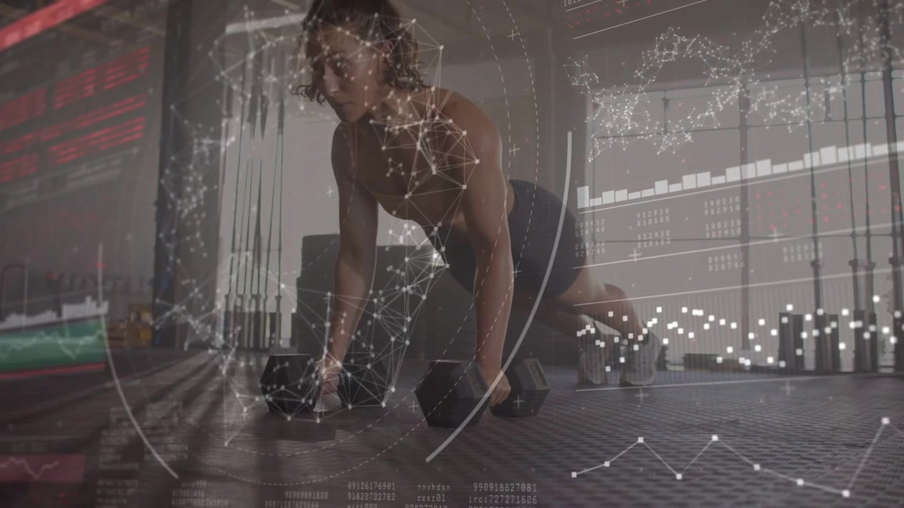 Woman doing gym set on mat, pushing onto dumbbells activating data, alternating rows for core power
