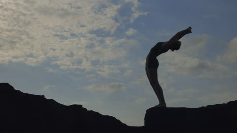 yoga silhouette at the beach