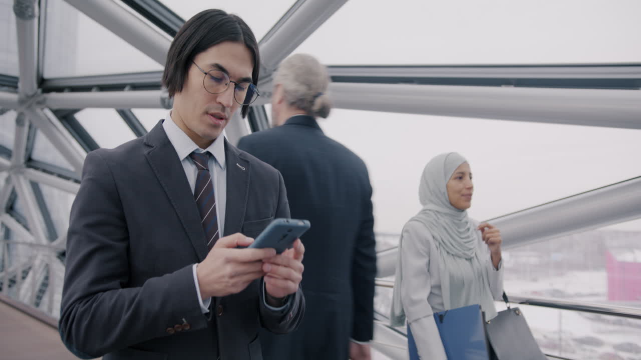 Business Professionals on a City Bridge