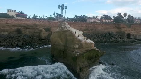 Pan-shot-of-rock-at-sunset