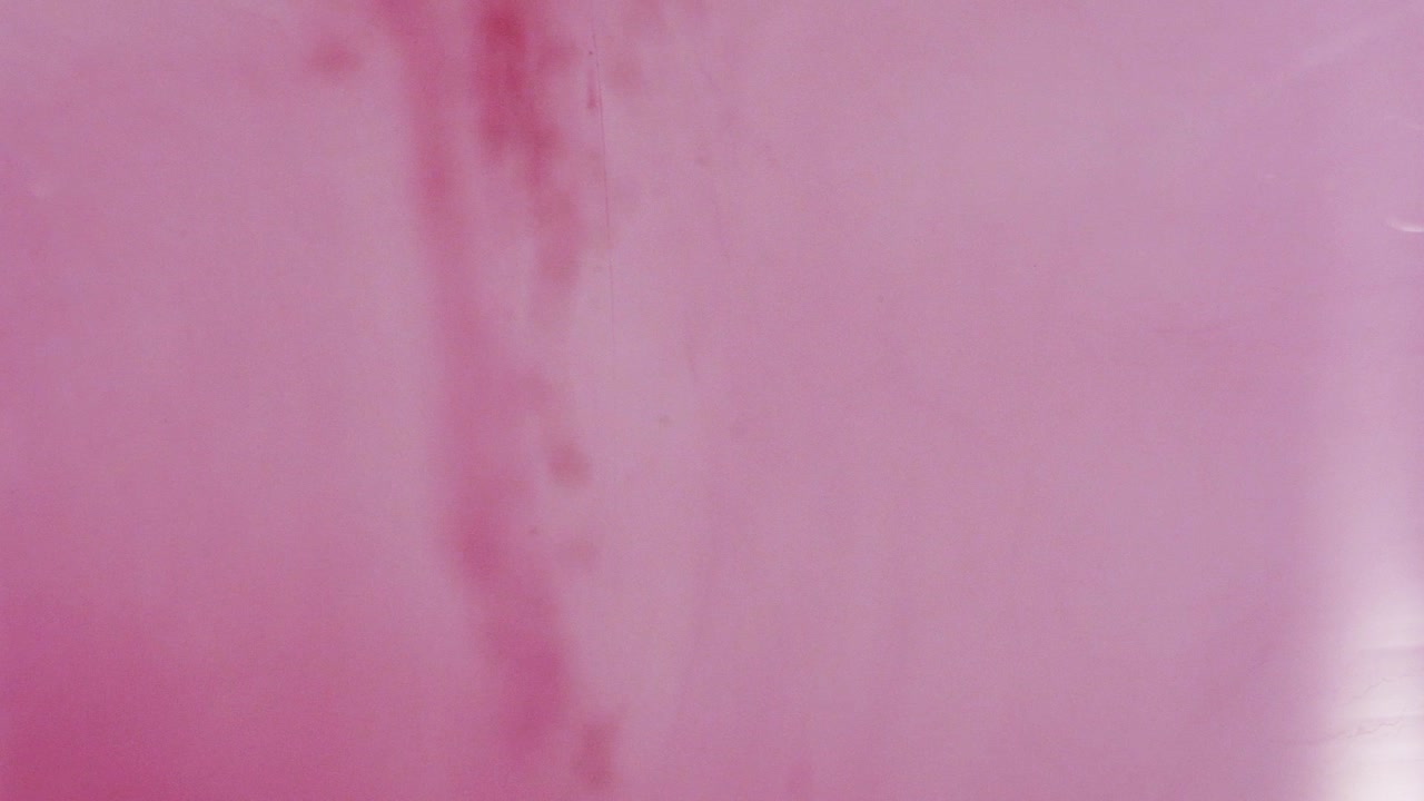 Abstract Pink and Red Ink in Water