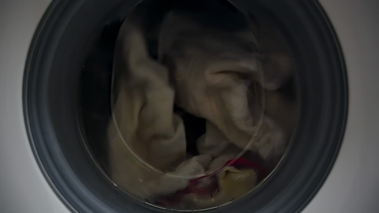 Close up of laundry spinning in a washing machine
