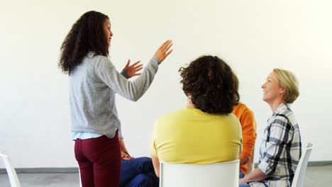 woman interacting with people 4k