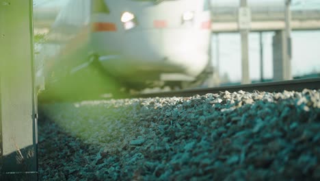 A-high-speed-Train-running-at-full-speed-passing-by-filmed-very-close-to-the-train-tracks-with-a-tele-lens