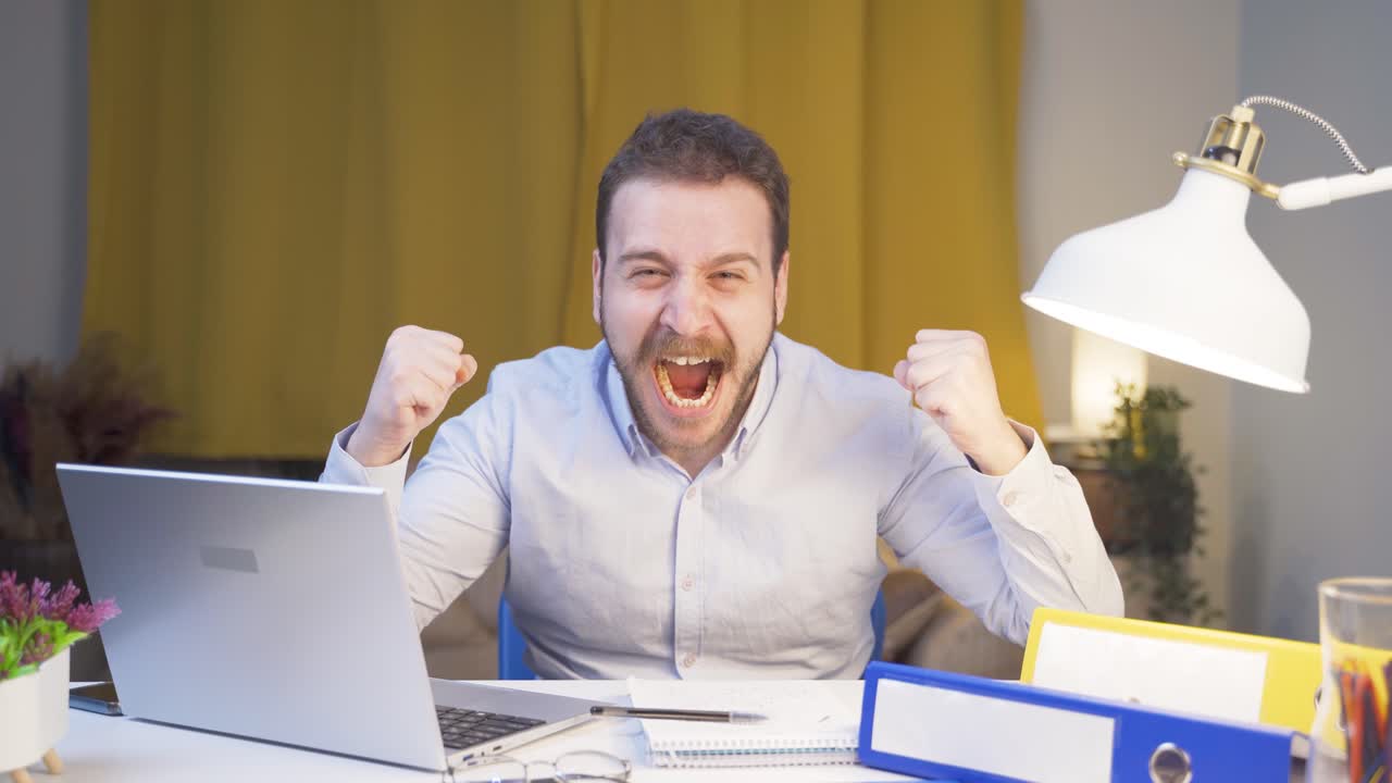 Home office worker man having a nervous breakdown.