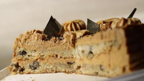 close up focus on background to foreground of caramel chocolate cake