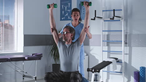 physical therapy session with dumbbells