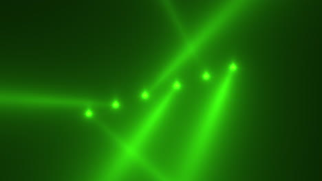 green glowing spotlight beams on black gradient stage