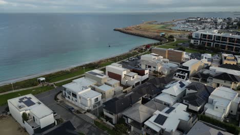 aerial view of coogee beach with suburb neighborhood in perth city during sunset time, western australia