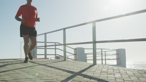 senior man running on the promenade