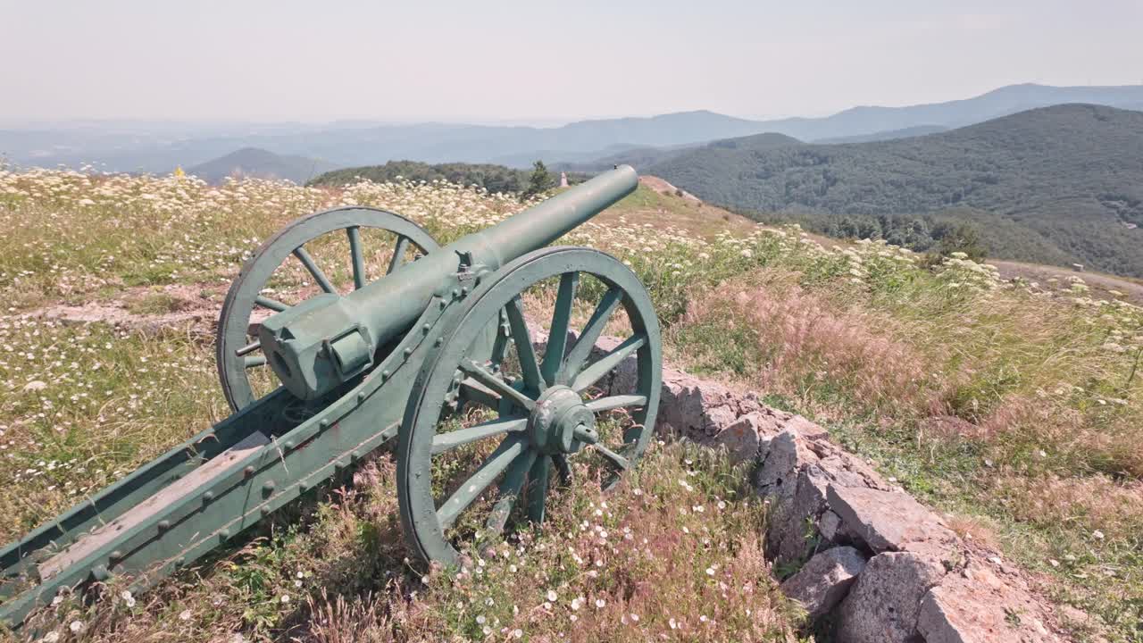 Vintage Cannon on a Mountain Hilltop with Scenic Vista