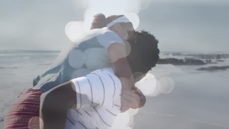 animación de una feliz pareja afroamericana divirtiéndose en la playa sobre el paisaje marino