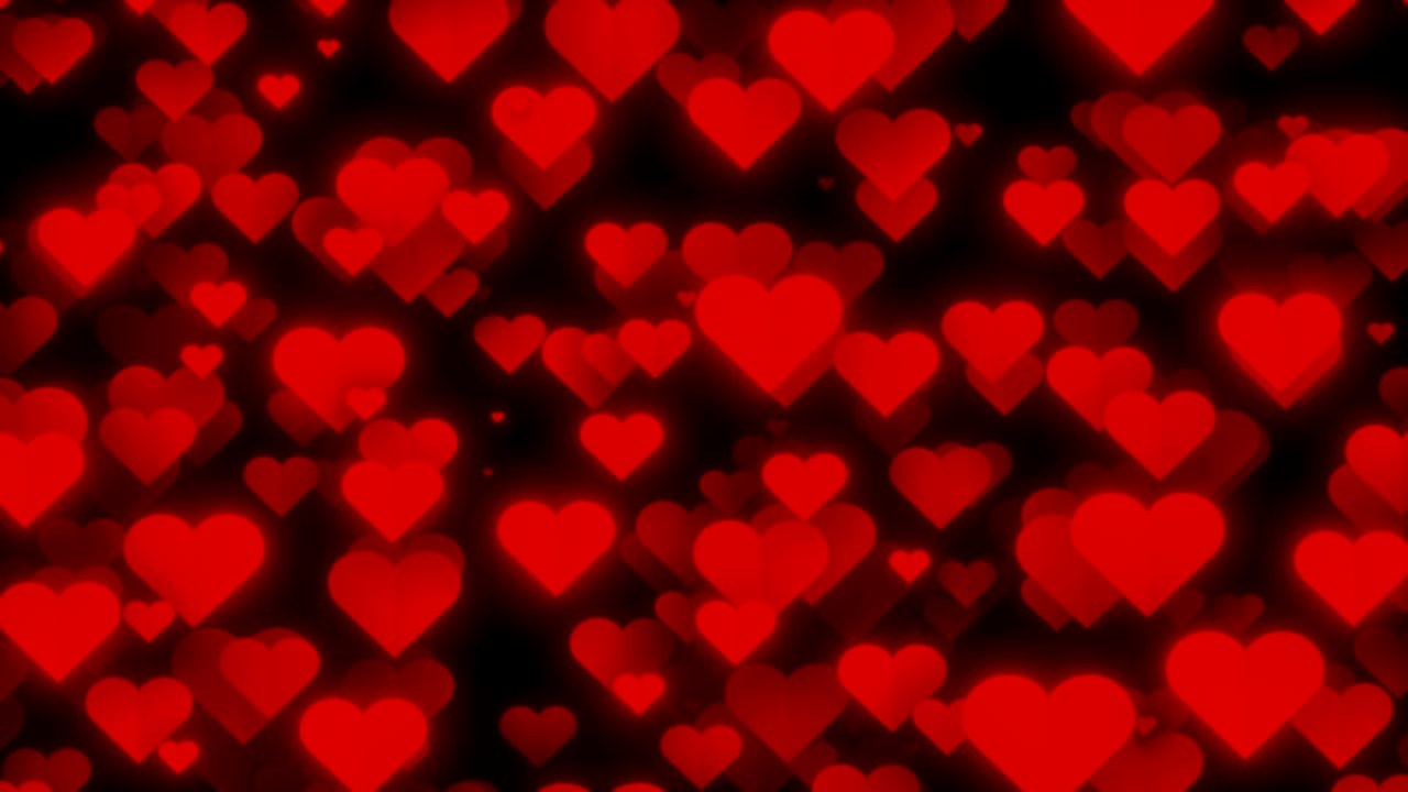 formas de corazón rojo en el fondo del día de san valentín oscuro