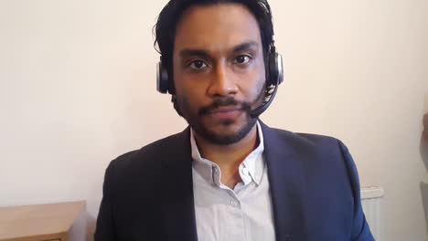 young man on business video call waiting for meeting to start