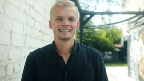 smiling young man outdoors