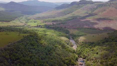 South-Africa-aerial-drone-Lisbon-Berlin-Falls-waterfalls-Sabie-cinematic-Kruger-National-Park-partially-cloudy-lush-spring-summer-green-stunning-river-landscape-bush-slowly-forward-movement