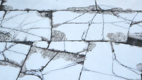 cracked white marble pavement