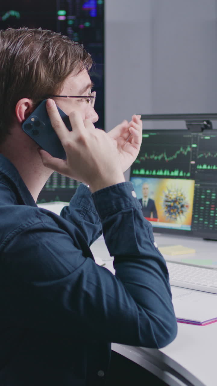 Businessman on phone in a financial office
