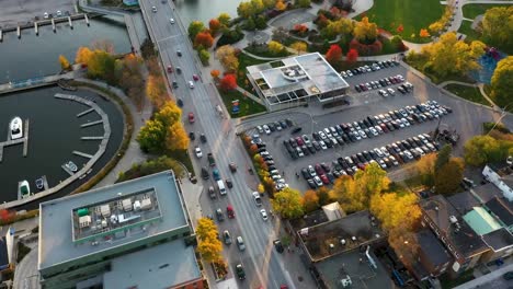 Top-down-sunrise-aerial-view-of-downtown-Mississauga-near-a-harbor