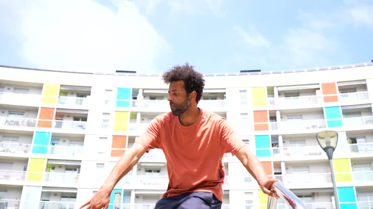 Man on the street next to building