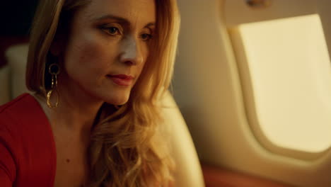 focused ceo look laptop computer closeup. successful woman work on private jet
