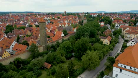 4k aerial drone video of the sulfur tower, hohenner tower, röderturm tower, and thomas towers on the walled city of rothenburg, germany