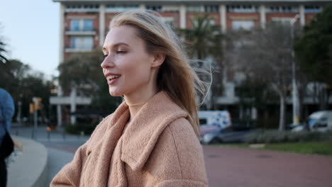 young woman sending kiss to camera.