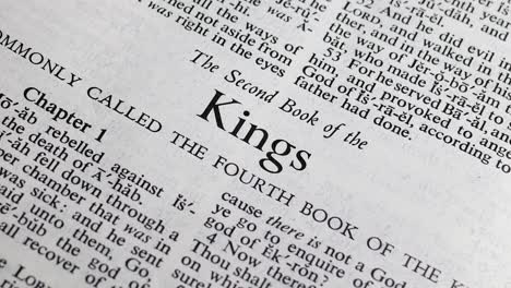 cu bible page turning to the book of second kings