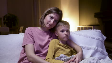 Mother-and-son-watching-film