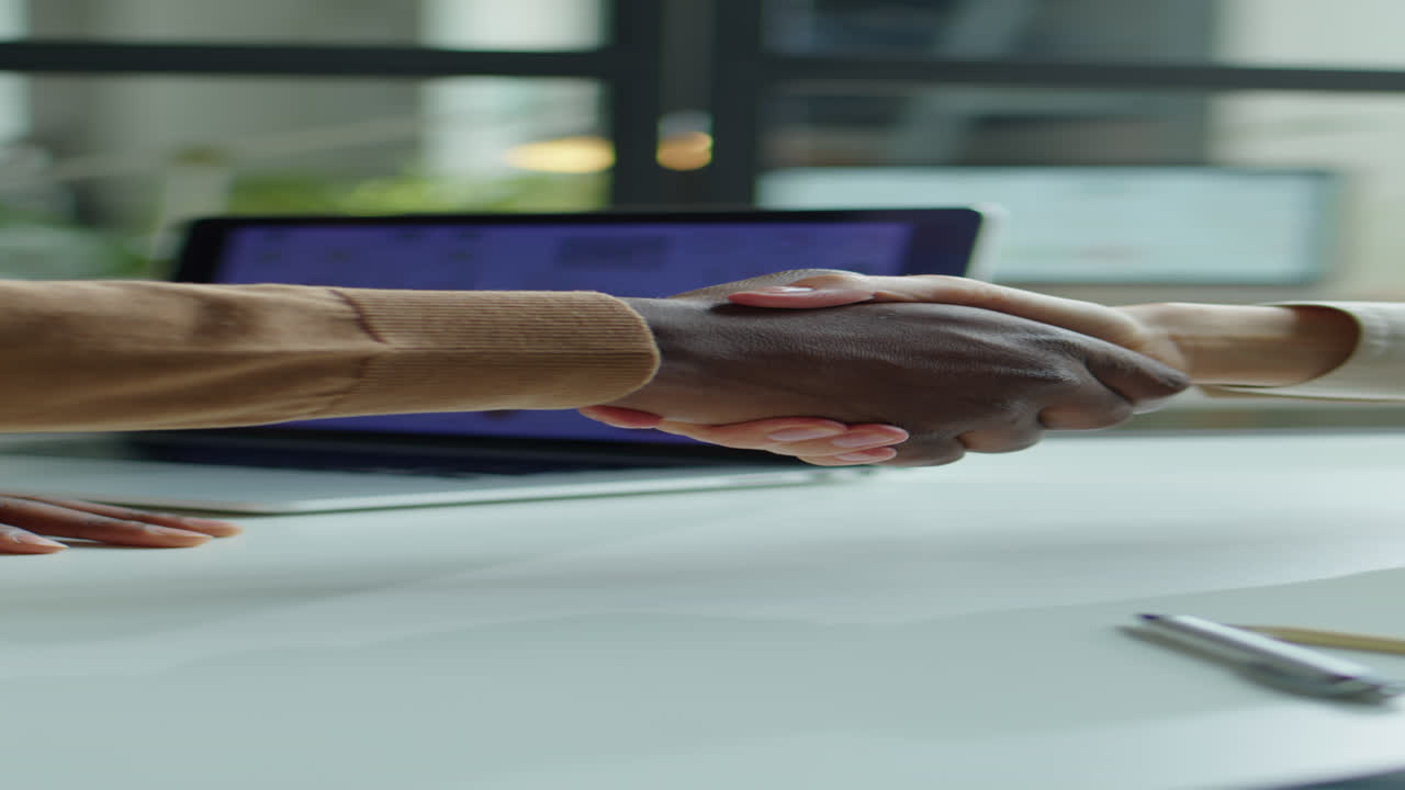 Close Up of Handshake of Two Colleagues