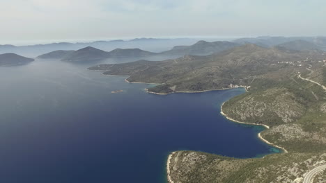 Flight-over-desert-islands-and-colorful-sea,-Brijuni-park,-Croatia