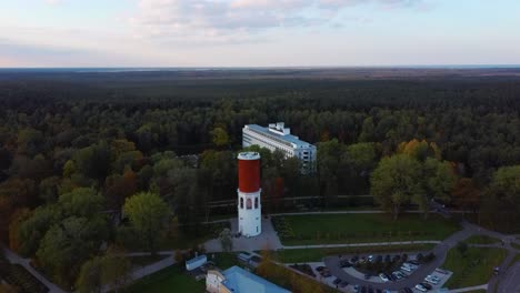 kemeri water tower with latvian flag in the kemeri resort park in jurmala, latvia