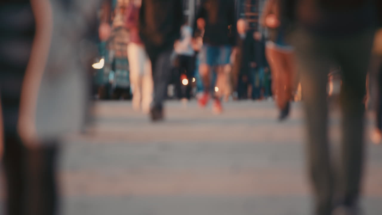 Anonymous crowd of people walking  commuters London City street slow motion