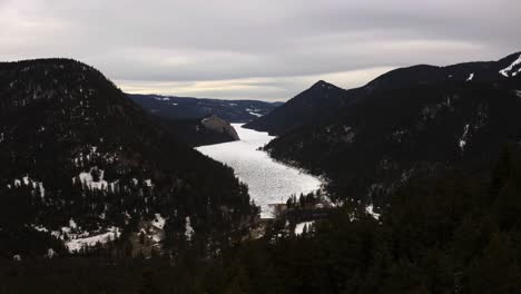 discover the serenity of paul lake: a winter oasis enveloped by verdant evergreen forests and pristine snowscapes, just minutes away from kamloops, british columbia