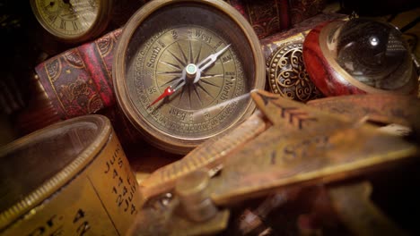 vintage style travel and adventure. vintage old compass and other vintage items on the table.