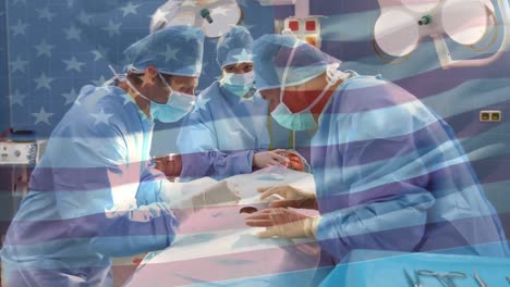 Animation-of-flag-of-usa-waving-over-surgeons-in-operating-theatre