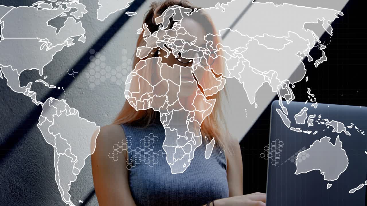 Woman typing laptop lifting chin starting tech map overlay covering frame with hex lines working